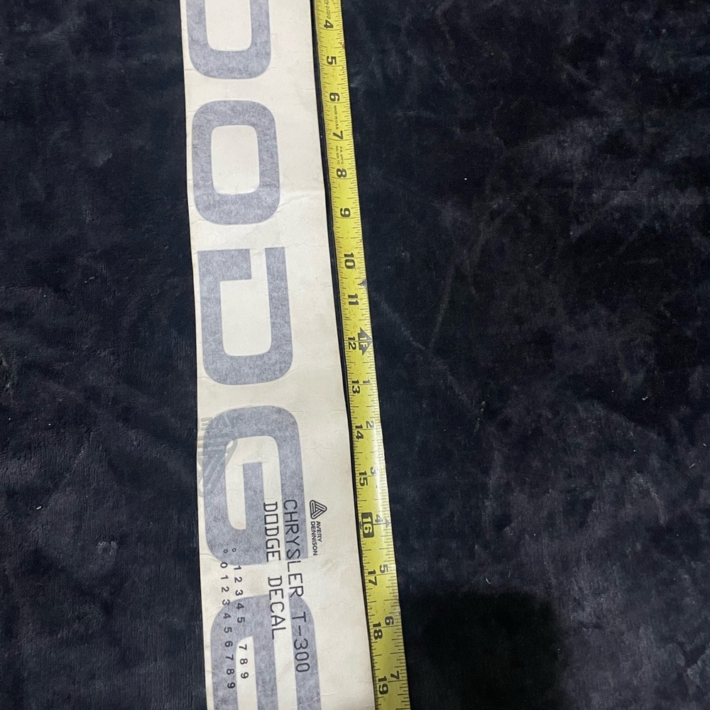 White and Blue Measuring Tool with Standard Markings